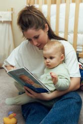 Angie reads to Olivia